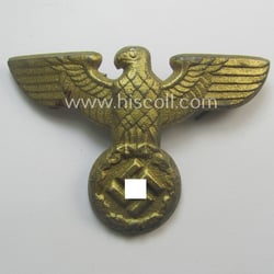 Bright-golden-coloured- and/or: zinc- (ie. 'Feinzink'-) based (political-style) visor-...