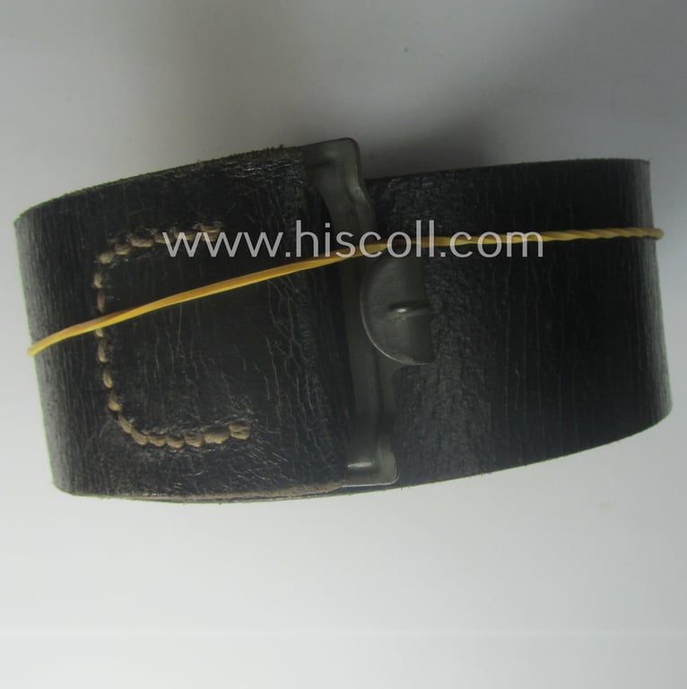 Hardly used, early- (ie. mid-) war-period, black-coloured WH (Heeres, Luftwaffe, Waffen-SS etc.) 'standard-issue'-pattern belt (ie. 'Koppelriemen') being a 115 cms. sized example that shows a (clear) makers'-designation and/or date: '1942'