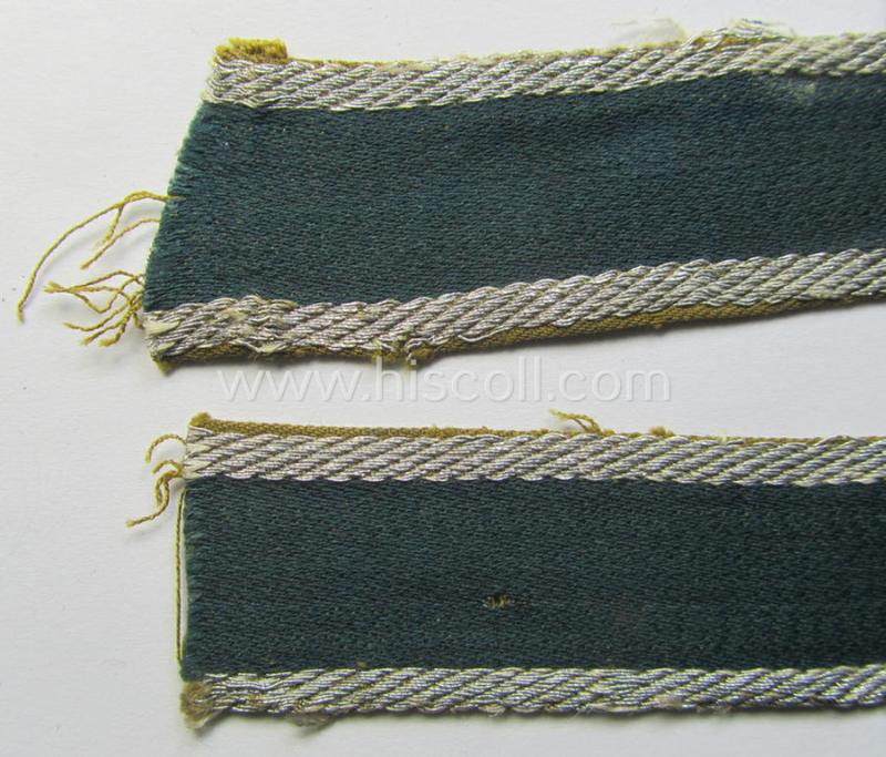 Attractive, 'BeVo'-like cuff-title (ie. 'Ärmelstreifen') entitled: 'Afrikakorps' being a with certainty issued and truly worn example that comes in an overall nice- (ie. minimally shortened- and/or once tunic-attached-), condition