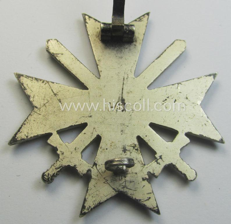 Attractive - and just moderately used! - example of a: 'Kriegsverdienstkreuz 1. Kl. mit Schwertern' being a maker- (ie. 'L/11'-) marked (and/or: 'Buntmetall'-based!) specimen that came as issued and/or stored for decades