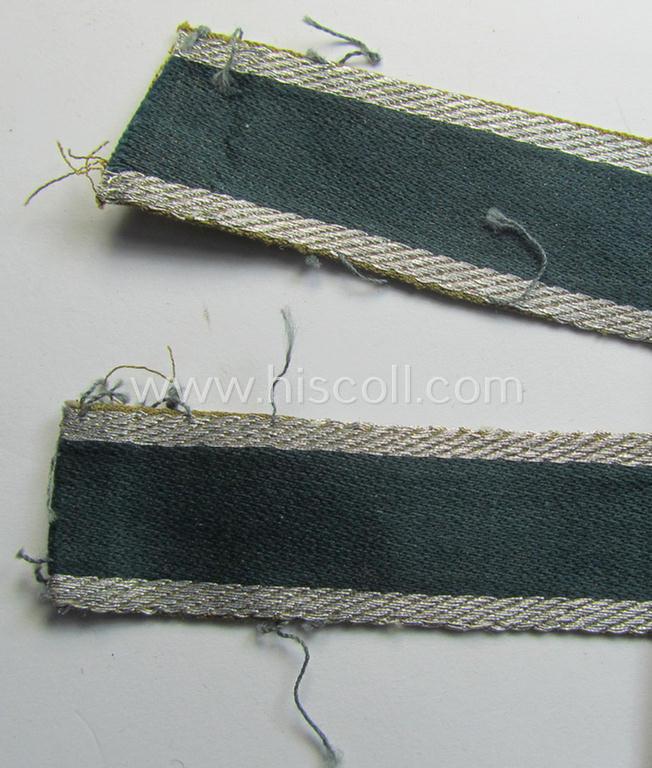 Attractive, 'BeVo'-like cuff-title (ie. 'Ärmelstreifen') entitled: 'Afrikakorps' being a with certainty issued and truly worn example that comes in an overall nice- (ie. hardly shortened- and/or once tunic-attached-), condition