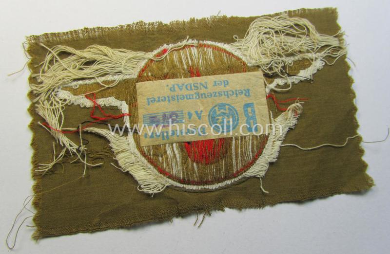 Superb - and rarely encountered! - breast-badge as executed in 'BeVo-weave' pattern as was intended for members within the 'N.S.D.A.P. Reichsautozug' (or: 'RaZ') still retaining its period, paper-based 'RzM'-etiket