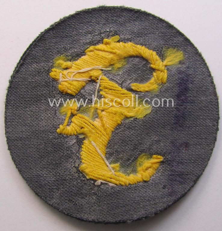 WH (Heeres) so-called: trade- and/or special-career arm-insignia (ie. 'Laufbahn- o. Tätigkeitsabzeichen') as was specifically intended for an army: 'Feuerwerker' (ie. artician)