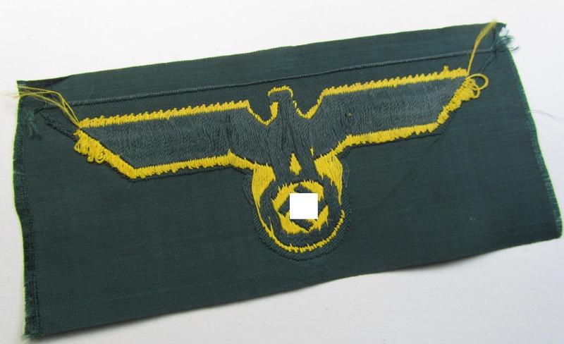 WH (Kriegsmarine) ie. 'Küsten-Art.'-related breast-eagle (ie. 'Brustadler für Mannschaften u. Uffz. der Küsten-Artillerie-Truppen') being a 'standard-pattern-example as executed in the 'BeVo'-weave-pattern on a darker-green-coloured background
