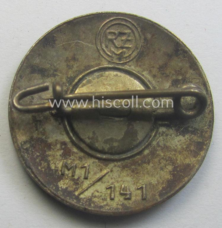 'N.S.D.A.P. - Parteiabzeichen' showing the makers'-designation: 'RzM' and/or: 'M1/141'
