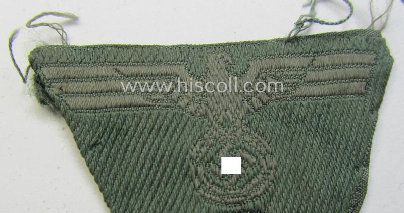 WH (Heeres) so-called: 'M43-pattern') cap-eagle/cocarde (ie. cap-trapezoid) as was specifically produced for usage on the so-called: 'M-43'-model field-caps (ie. 'Einheitsfeldmützen')