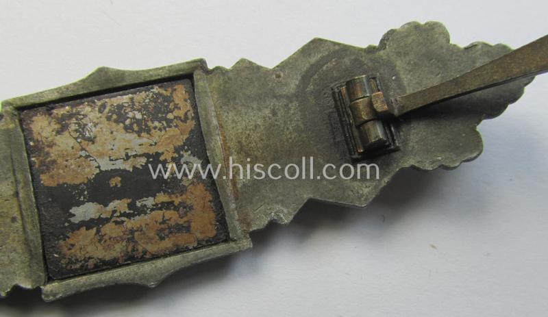 'Nahkampfspange in Bronze' (or: bronze-class close-combat clasp ie. CCC) being a maker- (ie. 'F.&B.-L.'-) marked- and/or minimally converse-shaped specimen as was produced by the maker- (ie. 'Hersteller') 'Funcke u. Brüninghaus'