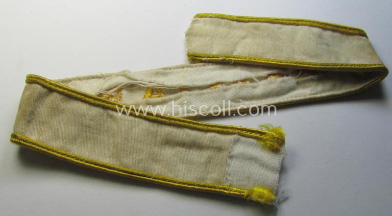 Superb, WH cuff-title (ie. 'Ärmelstreifen') entitled: 'Kreta' (being an example that bears a printed 'RbN.'-numeral and that comes in an issued-, clearly worn- and/or most certainly once tunic-attached, condition)