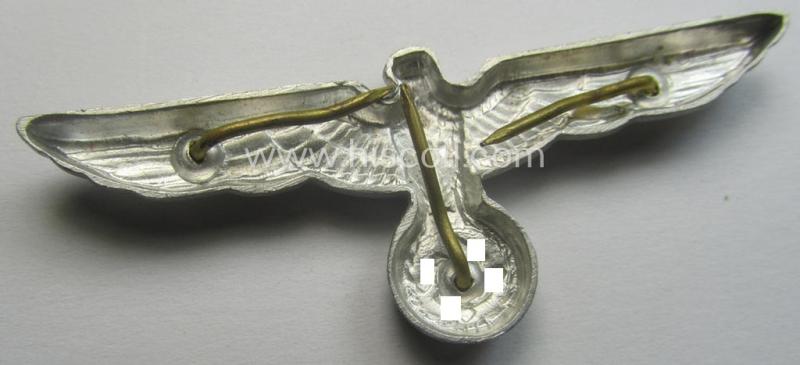 WH (Heeres) bright-silver-toned (ie. aluminium-based), EM- (ie. NCO- or officers') type visor-cap-eagle being a non-maker-marked example that comes in a just minimally used- ie. (I deem) once cap-attached, condition