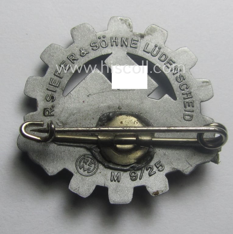Scarcely found, resin-based DAF- (ie. 'Deutscher Arbeits Front'-) related 'tinnie' being a maker- (ie. 'R. Sieper & Söhne'-) marked example depicting a 'KdF'-Wagen, swastika-device and text: 'Mit KdF zur Int.Autoausstellung Berlin - 1939'