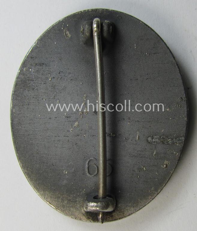 Attractive - and moderately used- and worn! - example of a maker- (ie. '65'-) marked example of a silver-class wound-badge (or: 'Verwundeten-Abzeichen in Silber') as was produced by the 'Hersteller' ie. maker: 'Klein u. Quenzer'