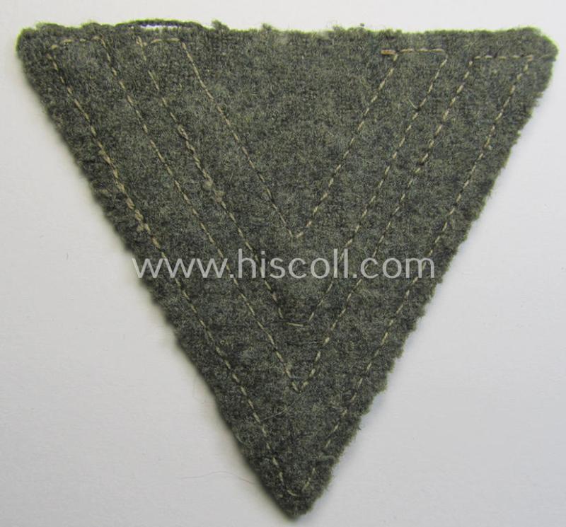 WH (Heeres) 'Armwinkel' (or: arm-chevron) as executed on typical field-grey-coloured wool as was specifically intended for usage by a soldier with the rank of: 'Obergefreiter'