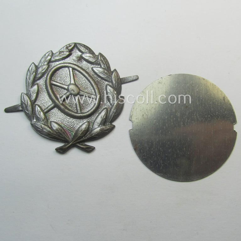 WH (Heeres, LW ie. Waffen-SS-) so-called: 'Kraftfahrbewährungs-Abzeichen in Silber' being a 'virtually mint' example as was produced by the Austrian-based maker: 'Rudolf Souval - Wien VII/62' and that came stored in its 'Zellstoff'-based pouch