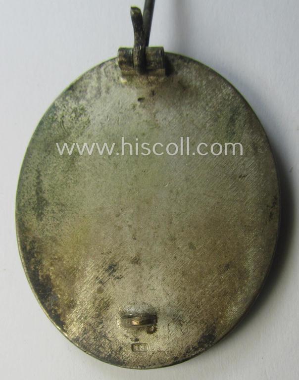 Unusually found, 'Verwundeten-Abzeichen in Silber' being a clearly maker- (ie. '13'-) marked, 'Buntmetall'-based example by the maker (ie. 'Hersteller') named: 'Gustav Brehmer'