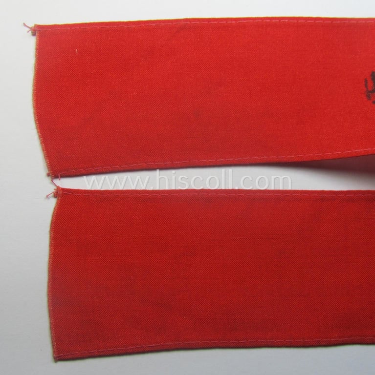 Unusually encountered - and most certainly scarcely seen! - thin-shaped, 'N.S.D.A.P.'-related armband (ie. 'Armbinde') being of the 'entirely printed'-type showing a swastika and text: 'NSDAP - Partei-Bereitschaft'