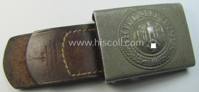 Superb, WH (Heeres) 'standard-pattern', field-grey-toned- and aluminium-based belt-buckle being a maker- (ie. 'Bernh. Haarmann'-) marked- and/or '1939'-dated example that comes mounted onto its (unit-stamped!) leather-based tab