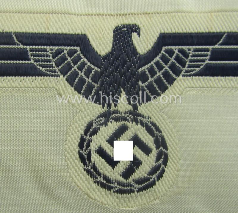 WH (KM) related breast-eagle (ie. 'Brustadler für Mannschaften u. Uffz. der Kriegsmarine') being a 'standard-issue'-pattern-example as executed in the 'BeVo'-weave-pattern on a white-coloured background
