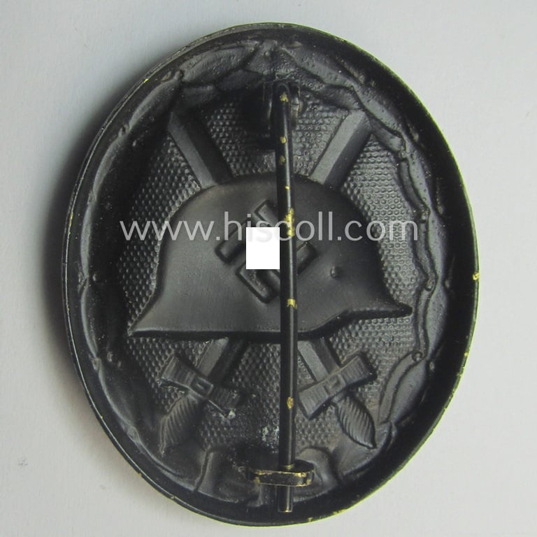 Moderately used- and/or worn black-class wound-badge (or: 'Verwundeten-Abzeichen in Schwarz') being a typical non-maker-marked (and non-magnetic) example