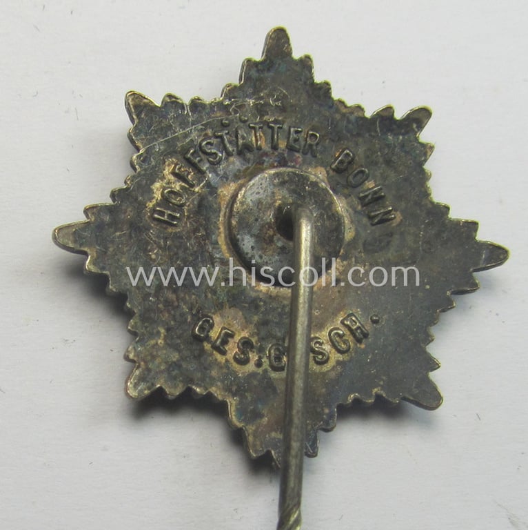 Semi-enamelled, RLB- (ie. 'Reichluftschützbund') 'Zivilabzeichen' or: civil-attire badge (of the first pattern) that is bearing a maker- (ie. 'Hofstätter - Bonn') and/or patent-pending- (ie. 'Ges.Gesch.'-) marking