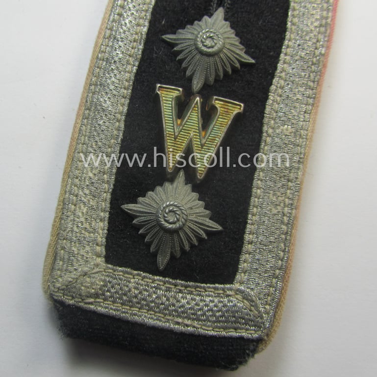 Superb, single Waffen-SS NCO-type (and neatly 'cyphered'!) shoulderstrap as piped in the white-coloured branchcolour as intended for usage by an: 'SS-Hauptscharführer' who served within the: SS-Rgt. 'Westland' ('5. SS-Pz-Gren.-Div. "Wiking")