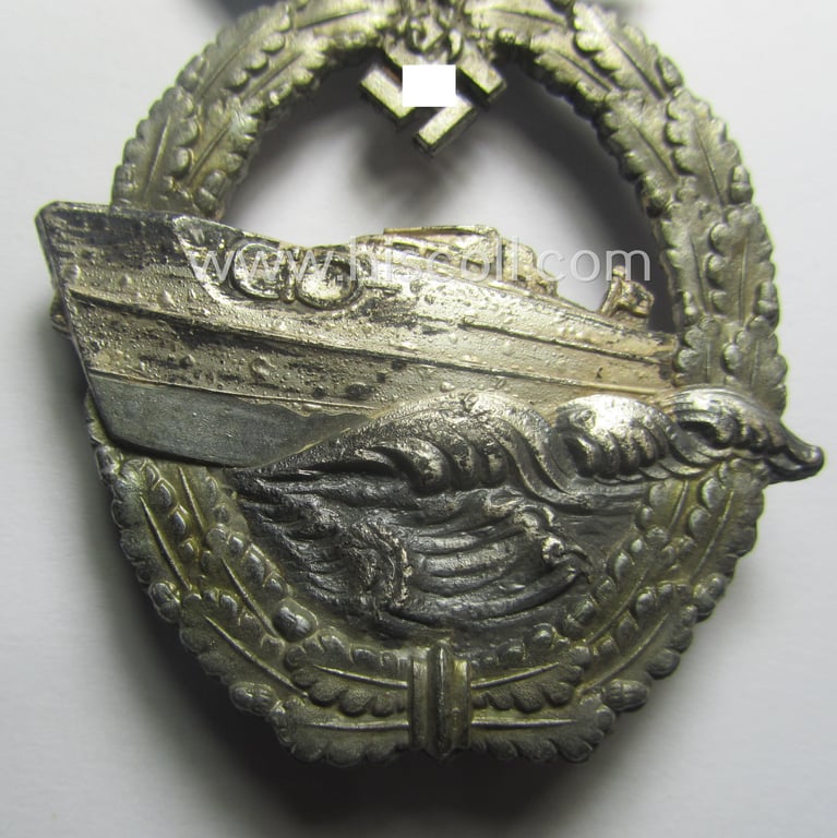 Superb, WH (Kriegsmarine) so-called: 'Kriegsabzeichen für Schnellboote - 2. Modell' (or: E-boat-war-badge of the 2nd model) being a maker- (ie. 'Fec. W.E. Peekhaus'-) marked example as was produced by the: 'Schwerin'-company