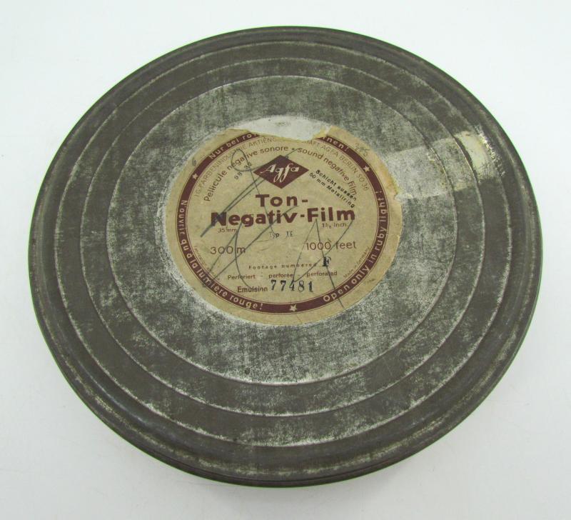 Large Film can with WWII 35mm film included