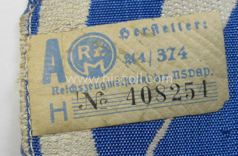 Attractive - and scarcely encountered! - SA (ie. 'Sturmabteilungen'), 'BeVo'-woven sport-shirt insignia still showing its period-attached 'RzM'-etiket as was intended for an SA-member who served within the: 'Gruppe Wartheland' (WA)