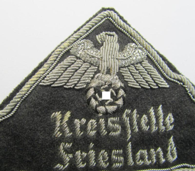 Stunning, German Red Cross (ie. 'Deutsches Rotes Kreuz' or 'DRK') greyish-coloured- and/or triangular-shaped and neatly hand-embroidered (ie. typically officers'-pattern!) arm-eagle entitled: 'Kreisstelle Friesland'