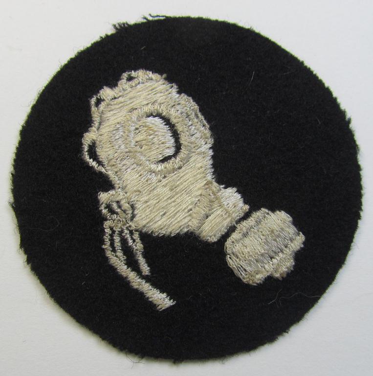 Attractive, Waffen-SS-related so-called: trade- and/or special-career arm-insignia, as was intended for a: 'Gasschutzunteroffizier' (or: gas-protection NCO) being a neatly machine-embroidered example