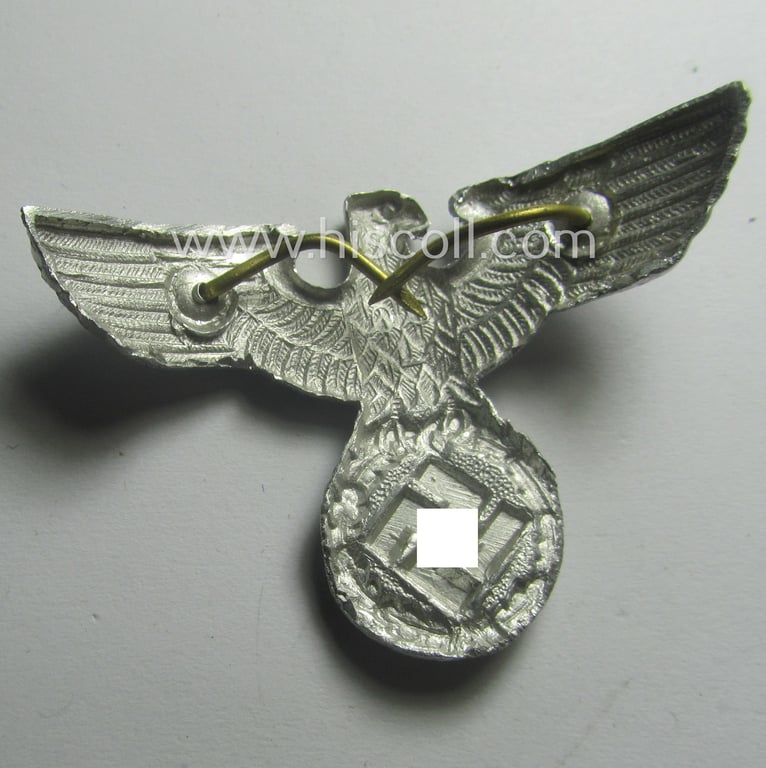 Bright-silver-coloured- and/or: aluminium-based (political-style) visor- (ie. 'Schirmmützen'-) cap-eagle being a detailed example that is neatly: 'OGL' marked on its back