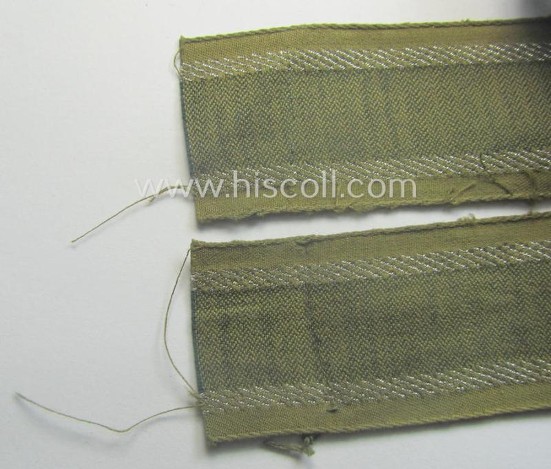 Truly worn, 'BeVo'-like cuff-title (ie. 'Ärmelstreifen') entitled: 'Afrikakorps' being a with certainty issued example that comes in an overall nice- (ie. hardly shortened- and/or once tunic-attached-), condition