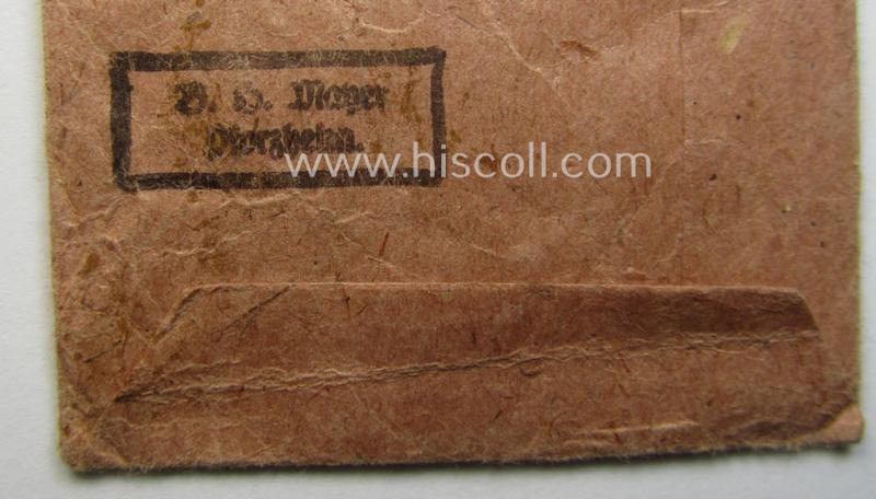 Empty 'Zellstoff'-based pouch as was intended for a medal: 'Winterschlacht im Osten 1941/42' as was produced by the company: 'B.H. Mayer's Kunstprägeanstalt' (ie. 'Hersteller 26')