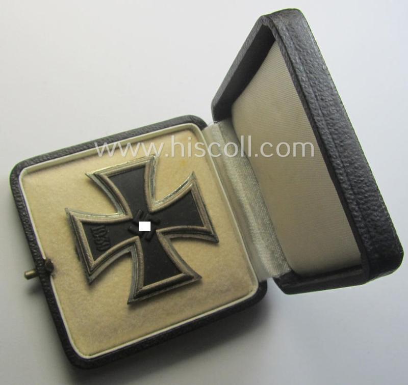 'Eisernes Kreuz 1. Klasse' (ie. Iron Cross 1st class) being an (I deem) mid-war-period produced: 'L/52'- (ie. by 'C.F. Zimmermann'-marked-) example and that comes complete in its specific etui