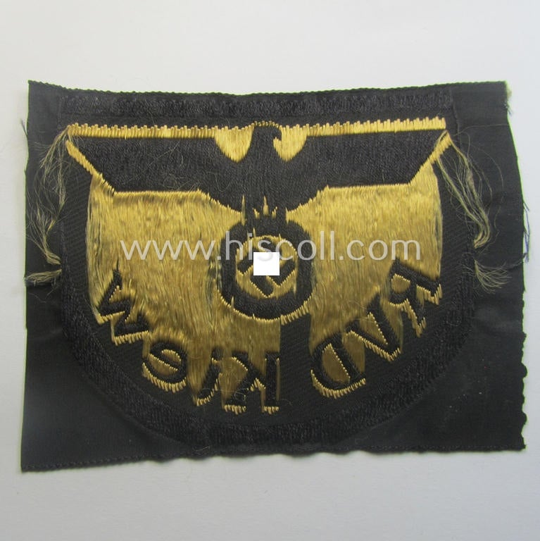 RB- ('Reichsbahn'-) related arm-eagle as executed in 'BeVo'-weave style, as was intended for an official of the: 'Deutsche Reichsbahn' ie. the: 'RVD Kiew' (or: 'Reichsverkehrsdirektion Kiew')