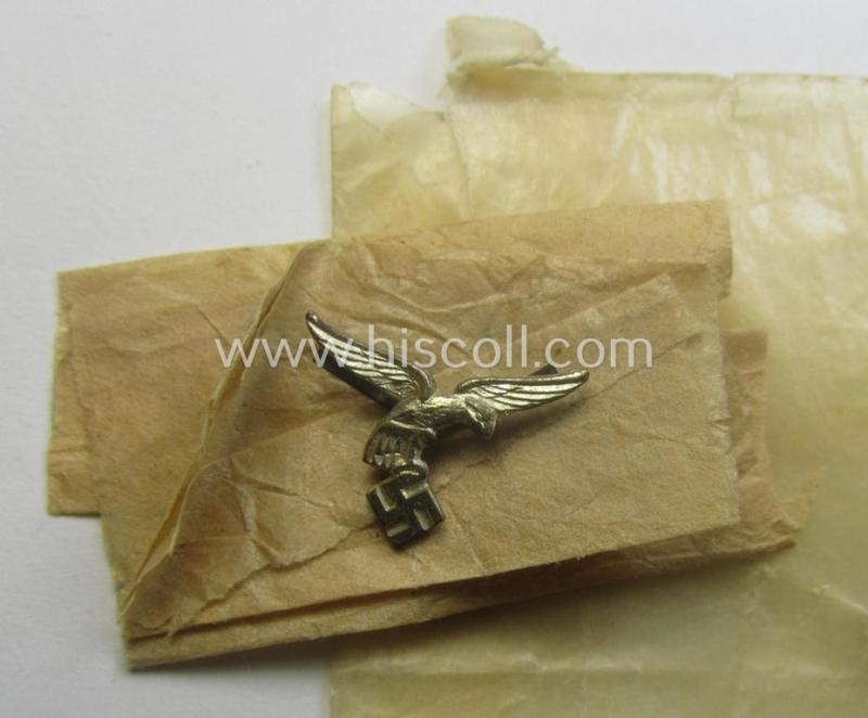 Superb - and usually seen! - WH (Luftwaffe) bright-silver-toned, 'WH-DA der 4. Klasse für 4 Jahre Dienstzeit' that comes with its accompanying ribbon (ie. 'Bandabschnitt') and eagle-device as stored in its period 'Cellophan'-based pouch