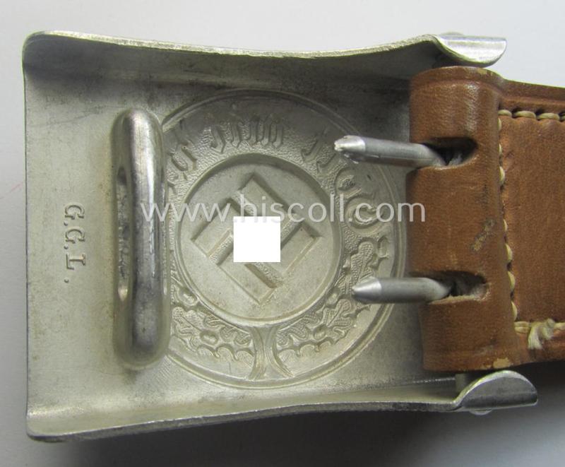 Police (ie. 'Polizei') aluminium-based belt-buckle (ie. 'Koppelschloss für Mannschaften u. Uffz. der Polizei') being a maker- (ie. 'G.G.L.'-) marked and/or '1938'-dated example that comes in a fully untouched, condition