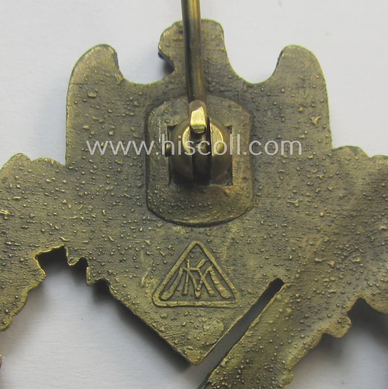 Superb, 'Infanterie Sturmabzeichen in Bronze' being a maker- (ie. 'MK' in a triangle-) marked (and/or minimally converse- ie. vaulted-) example by a to date still unidentified maker as was executed in golden-bronze-toned 'Feinzink'