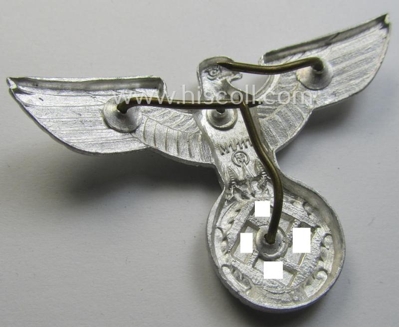 Bright silverish-grey-coloured- and typical aluminium-based (political-style) visor- (ie. 'Schirmmützen'-) cap-eagle being a detailed example that is neatly: 'RzM - M1/111'-marked on its back