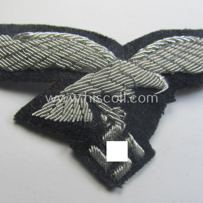'Virtually mint' WH (Luftwaffe) officers'-pattern breast-eagle (ie. 'Brustadler für Offiziere der Luftwaffe') being a neatly hand-embroidered example of the: 'Extra Qualität' that comes in a never used- nor tunic-attached, condition