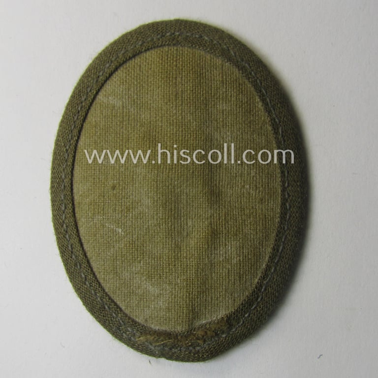 WH (Heeres) 'tropical-styled', trade- and/or special-career insignia (or: 'Signal Blitz') as was intended for a soldier who served within the: 'Artillerie-Trpn.'