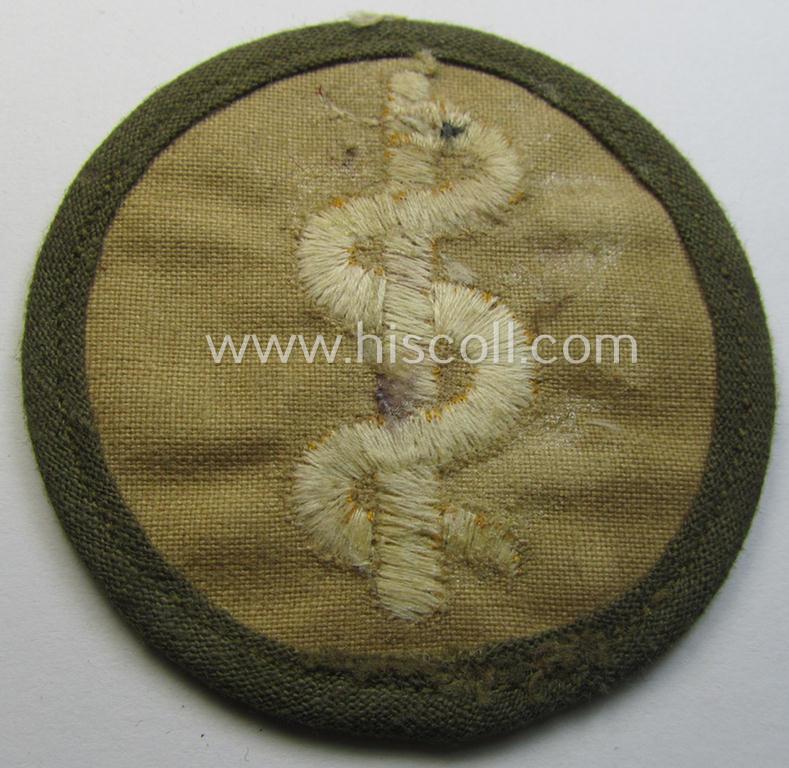 WH (Heeres) 'tropical'-issued, trade- and/or special-career insignia (ie. machine-embroidered 'Laufbahn- o. Tätigkeitsabzeichen') as was intended for an army: 'Sanitäter' (or medical-orderly)