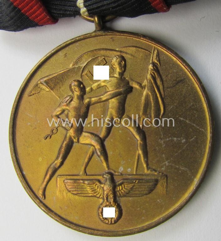 Attractive, 'variant'-pattern, bright golden-toned WH (Heeres o. KM etc.) so-called: 'Einzelspange' (being of the desirable 'detachable'-pattern) showing a WH Czech 'Anschluss'- (ie. occupation-) medal: '1 October 1938'
