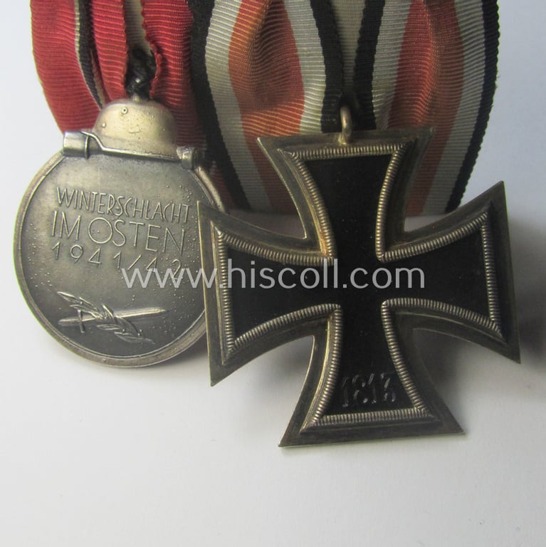Minimally used example of a two-pieced WH (Heeres, LW o. KM etc.) medal-bar (ie. 'Orden- o. Doppelspange') showing resp. an: 'EKII. Kl.' and a medal: 'Winterschlacht im Osten 1941-42'