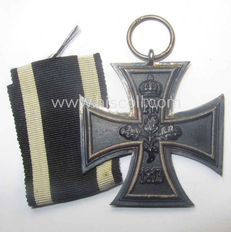 WWI-period: 'Eisernes Kreuz II. Klasse' being a typical maker- (ie. 'E.'- or evt. 'F.'-) marked example