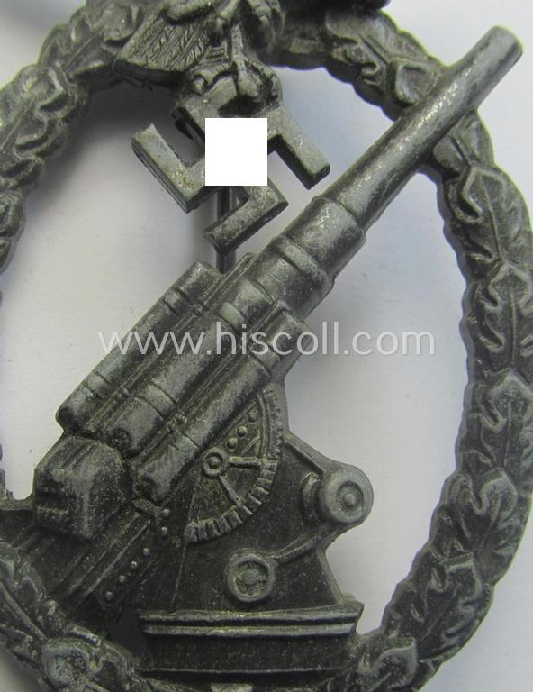 Later-war period- and/or: zinc- (ie. 'Feinzink'-) based- example of a maker- (ie. 'WH'-) marked, WH (Luftwaffe) 'Flakkampfabzeichen' (or: airforce anti-aircraft badge), as was produced by the desirable: 'Wilhelm Hobacher'-company