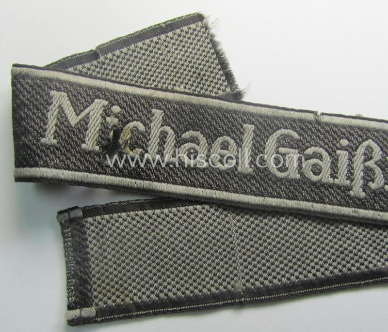 Truly used and/or worn - albeit regrettably somewhat damaged! - Waffen-SS cuff-title (ie. 'Ärmelstreifen') as executed in neat 'BeVo'-weave pattern as intended for a member serving within the: 'SS-Geb.Jäger-Regiment 12' - "Michael Gaißmair"