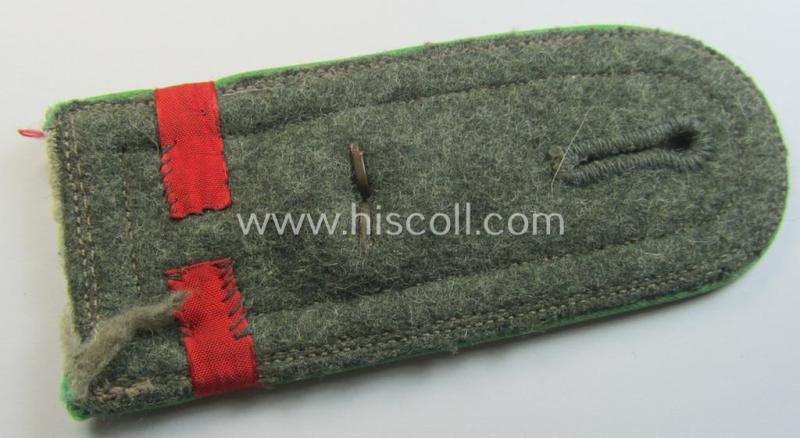 Single - and scarcely found! - WH (Heeres) early- (ie. mid-)war period- (ie. 'M40- o. M43'-pattern) NCO-type shoulderstrap as intended for usage by a: 'Feldwebel der Panzer-Grenadier-Truppen' and that shows a red-coloured indicator 'Lasche' att...