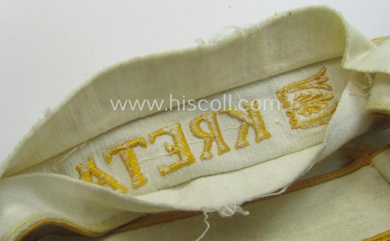 WH cuff-title (ie. 'Ärmelstreifen') entitled: 'Kreta' (being an example that comes in a clearly issued-, worn- and/or most certainly once tunic-attached, condition)