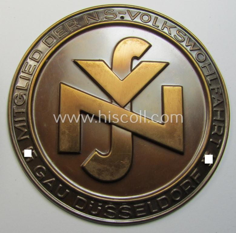 Attractive - and very detailed! - neatly reddish-bronze-coloured (and I deem copper-toned- ie. 'tin-metal'-based-) so-called: 'door-plaque' (ie. 'Türplakette') entitled: 'Mitglied der N.S.-Volkswohlfahrt' (N.S.V.) - Gau Düsseldorf'