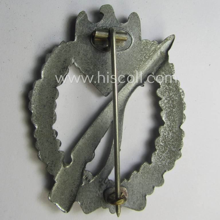 Superb, 'Infanterie Sturmabzeichen in Silber' being a non-maker-marked and/or typical zinc- (ie. 'Feinzink'-) based version (ie. 'crimped scooped rifle-variant') as was (I deem) procuded by the: 'S&L'- (ie. 'Steinhauer u. Lück'-) company